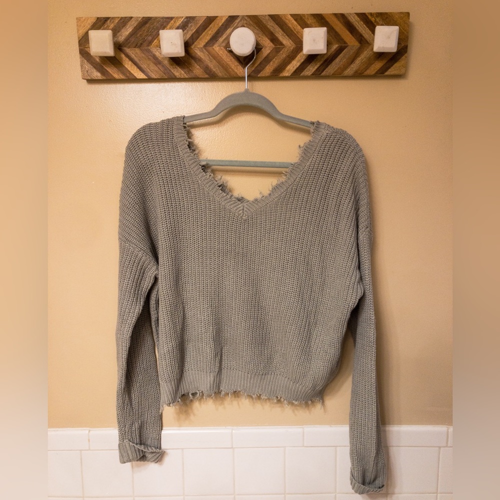 Pale green sweater